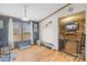 Dog-friendly living room with pet beds, built-in feeders, and natural lighting at 1691 Hopewell Church Rd, Catawba, NC 28609
