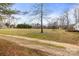 Spacious yard with mature trees, offering privacy and ample outdoor space at 1691 Hopewell Church Rd, Catawba, NC 28609