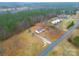 A home with a wooden deck is situated on a very large private lot at 1912 Beach Ln, Heath Springs, SC 29058