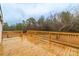 The back deck has wooden railings and is spacious at 1912 Beach Ln, Heath Springs, SC 29058