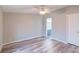 Bedroom with ceiling fan and view to bathroom at 1912 Beach Ln, Heath Springs, SC 29058