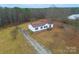 A sprawling home sits on a very large private lot at 1912 Beach Ln, Heath Springs, SC 29058