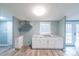 Bright kitchen with stainless appliances, granite counters and white cabinets at 1912 Beach Ln, Heath Springs, SC 29058