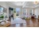 Bright foyer with hardwood floors, a playful teepee, and an open doorway at 208 Cape August Pl, Belmont, NC 28012