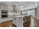 Modern kitchen featuring a central island and open floor plan concept at 208 Cape August Pl, Belmont, NC 28012
