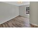 Bright bedroom featuring natural light, modern floors, and neutral paint at 215 Creek View Rd, Mooresville, NC 28117