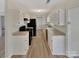 Efficient kitchen layout with modern appliances and bright lighting at 215 Creek View Rd, Mooresville, NC 28117