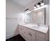 Elegant bathroom featuring dual sinks, a marble countertop, and a large mirror at 2511 Dundeen St, Charlotte, NC 28216
