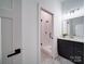 Modern bathroom with stylish shower and sleek vanity at 2511 Dundeen St, Charlotte, NC 28216