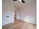 Bedroom with hardwood floors, closet, and plenty of natural light at 2511 Dundeen St, Charlotte, NC 28216