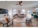 Spacious living room with hardwood floors, neutral decor, and natural light boasts an inviting atmosphere at 2511 Dundeen St, Charlotte, NC 28216