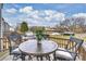 This back deck features outdoor seating, a grill, and clear skies at 2536 Grantham Place Dr, Fort Mill, SC 29715