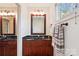 Well-appointed half bathroom featuring a granite countertop and modern fixtures at 3536 Wylie Meadow Ln, Charlotte, NC 28269