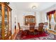Elegant dining room with hardwood floors, classic furnishings, and ample space for entertaining at 3536 Wylie Meadow Ln, Charlotte, NC 28269