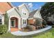 Welcoming front entry with brick accents and well-maintained landscaping at 3536 Wylie Meadow Ln, Charlotte, NC 28269