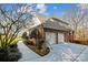 Three-car garage and spacious driveway with mature trees at 3536 Wylie Meadow Ln, Charlotte, NC 28269