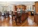 Spacious kitchen with a central island, stainless steel appliances, and a dining area at 3536 Wylie Meadow Ln, Charlotte, NC 28269