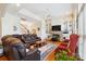 Inviting living room features a fireplace, built-in shelving, and comfortable furnishings at 3536 Wylie Meadow Ln, Charlotte, NC 28269