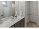 Bright bathroom with dual sinks, granite countertops, and modern fixtures at 4159 Millstream Rd, Denver, NC 28037
