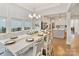 Lovely dining area with natural light and an open kitchen area for entertaining at 4159 Millstream Rd, Denver, NC 28037