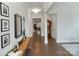 Elegant foyer with hardwood floors, decorative accents, and ample natural light at 4159 Millstream Rd, Denver, NC 28037