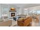 Inviting living room with fireplace, tv, and an open floor plan at 4159 Millstream Rd, Denver, NC 28037