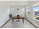 Bright office featuring windows, a neutral color palette, and a spacious layout at 4159 Millstream Rd, Denver, NC 28037