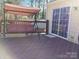 Spacious backyard deck with canopy swing, ideal for relaxation and enjoyment at 5426 Jaslie Ln, Charlotte, NC 28227