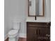 Modern bathroom featuring a vanity, sink, toilet, and storage space at 6055 Brush Crk, Monroe, NC 28110