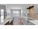 Spacious open-concept kitchen featuring hardwood floors and stainless steel appliances at 6055 Brush Crk, Monroe, NC 28110