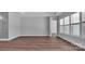 Bright, open living space with hardwood floors and large windows at 6055 Brush Crk, Monroe, NC 28110