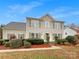 Charming two-story home with mature landscaping and a well-maintained lawn at 609 Sunset Point Dr, Rock Hill, SC 29732