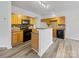 Well-lit kitchen showcasing ample cabinet space, stylish backsplash, and modern appliances at 609 Sunset Point Dr, Rock Hill, SC 29732