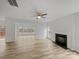 Spacious living room features hardwood floors, a fireplace, and large windows at 609 Sunset Point Dr, Rock Hill, SC 29732