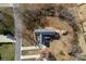 An aerial view of the well-maintained house showcases the driveway, backyard, and storage shed at 662 Georgie St, Troutman, NC 28166