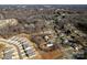 The neighborhood is presented through an aerial view, showing the street layout and the surrounding houses at 662 Georgie St, Troutman, NC 28166