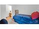 Bedroom with a twin bed, blue cover and a view into the bathroom at 662 Georgie St, Troutman, NC 28166