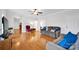 Bright living room with hardwood floors, a ceiling fan and neutral paint for a relaxing atmosphere at 662 Georgie St, Troutman, NC 28166