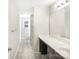 Bathroom with vanity, sink, and shower-tub combo with curtain at 7535 Meridale Forest Dr # 107, Charlotte, NC 28269