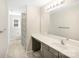 Bathroom with vanity, sink, and shower-tub combo with curtain at 7535 Meridale Forest Dr # 107, Charlotte, NC 28269