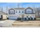 Charming two-story home with a two-car garage and covered front porch at 7535 Meridale Forest Dr # 107, Charlotte, NC 28269