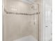 Modern bathroom shower with glass door and tiled walls at 7535 Meridale Forest Dr # 107, Charlotte, NC 28269