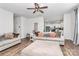 Open concept living room showcasing connection to the kitchen with stylish furniture and decor at 9203 Mackinaw Dr, Gastonia, NC 28056