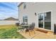 Charming patio with a dining table and chairs, offering a cozy outdoor dining experience at 9203 Mackinaw Dr, Gastonia, NC 28056