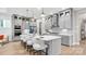Spacious kitchen with sleek gray cabinets, quartz countertops, and a large island with bar seating at 1039 Rabbit Hill Ln, Monroe, NC 28110
