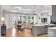 Open living area with a kitchen island, dining table, and comfortable seating; great for entertaining at 1039 Rabbit Hill Ln, Monroe, NC 28110