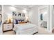 Bedroom with a queen-size bed, bedside tables with lamps, and en-suite bathroom at 1039 Rabbit Hill Ln, Monroe, NC 28110