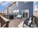 Inviting back deck with rocking chairs, grill and seating provides a relaxing outdoor retreat at 1051 Lookout Shoals Dr, Fort Mill, SC 29715