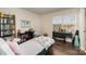 This bedroom has a plush bed, desk and a musical keyboard at 1051 Lookout Shoals Dr, Fort Mill, SC 29715
