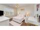 This bedroom features a plush bed, lots of light and a modern desk at 1051 Lookout Shoals Dr, Fort Mill, SC 29715